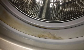 滚筒洗衣机怎么清理里面的脏东西（侧门滚筒洗衣机怎么清理里面的脏东西）